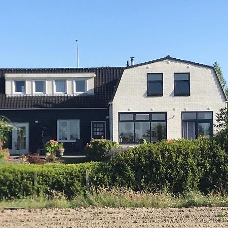 T Huuske Tuinappartement Met Fantastisch Uitzicht, Nabij Zee Zonnemaire Zewnętrze zdjęcie