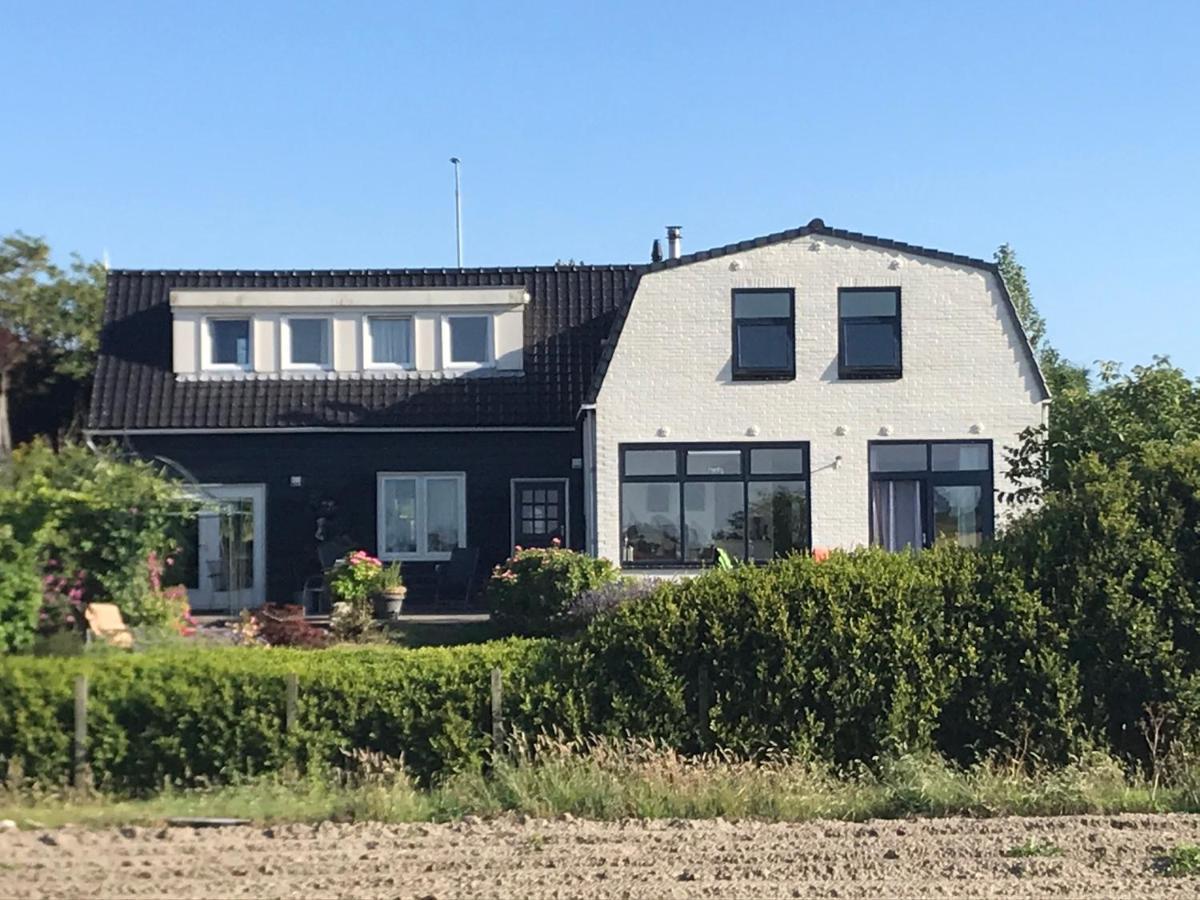 T Huuske Tuinappartement Met Fantastisch Uitzicht, Nabij Zee Zonnemaire Zewnętrze zdjęcie