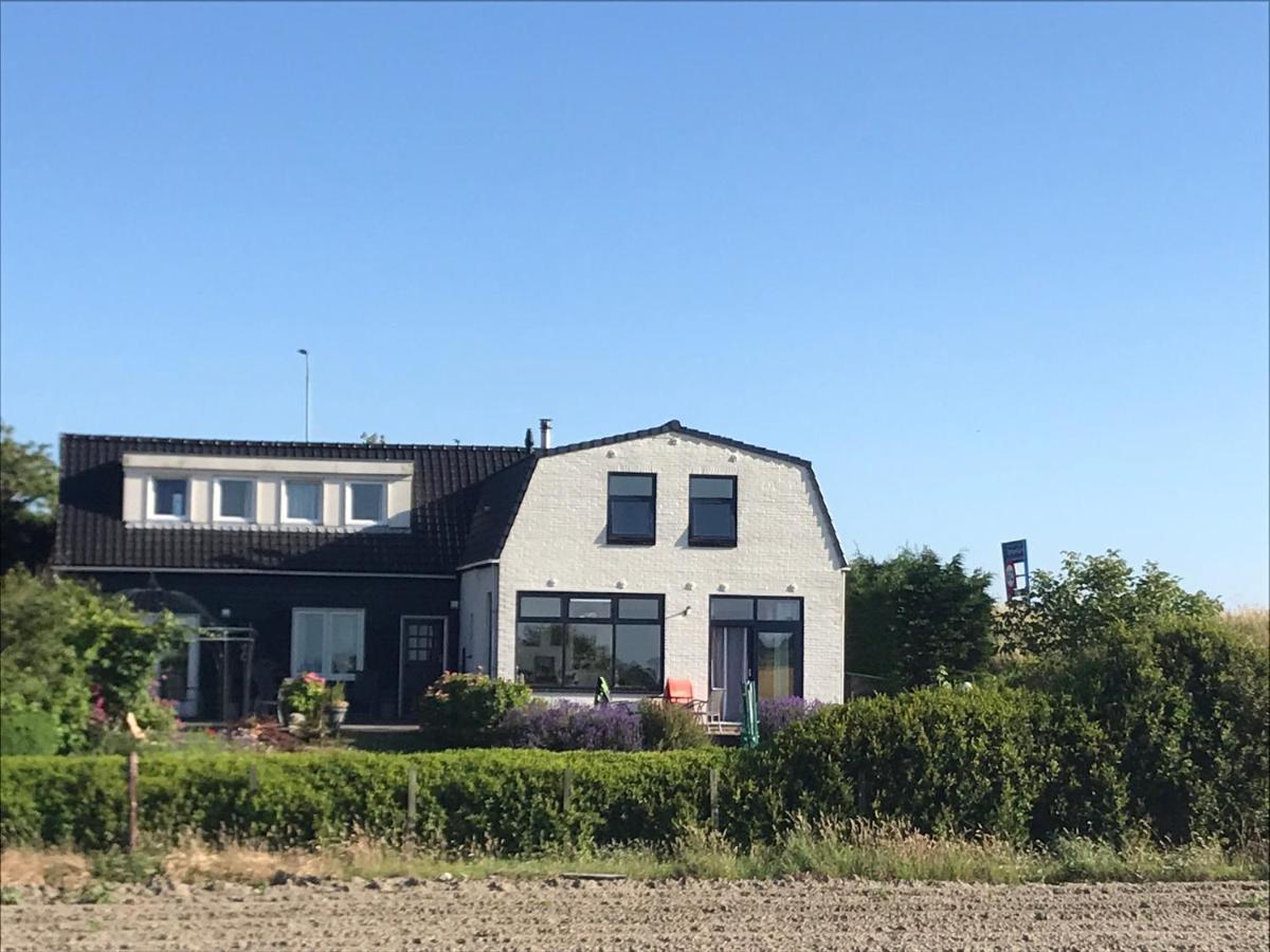 T Huuske Tuinappartement Met Fantastisch Uitzicht, Nabij Zee Zonnemaire Zewnętrze zdjęcie